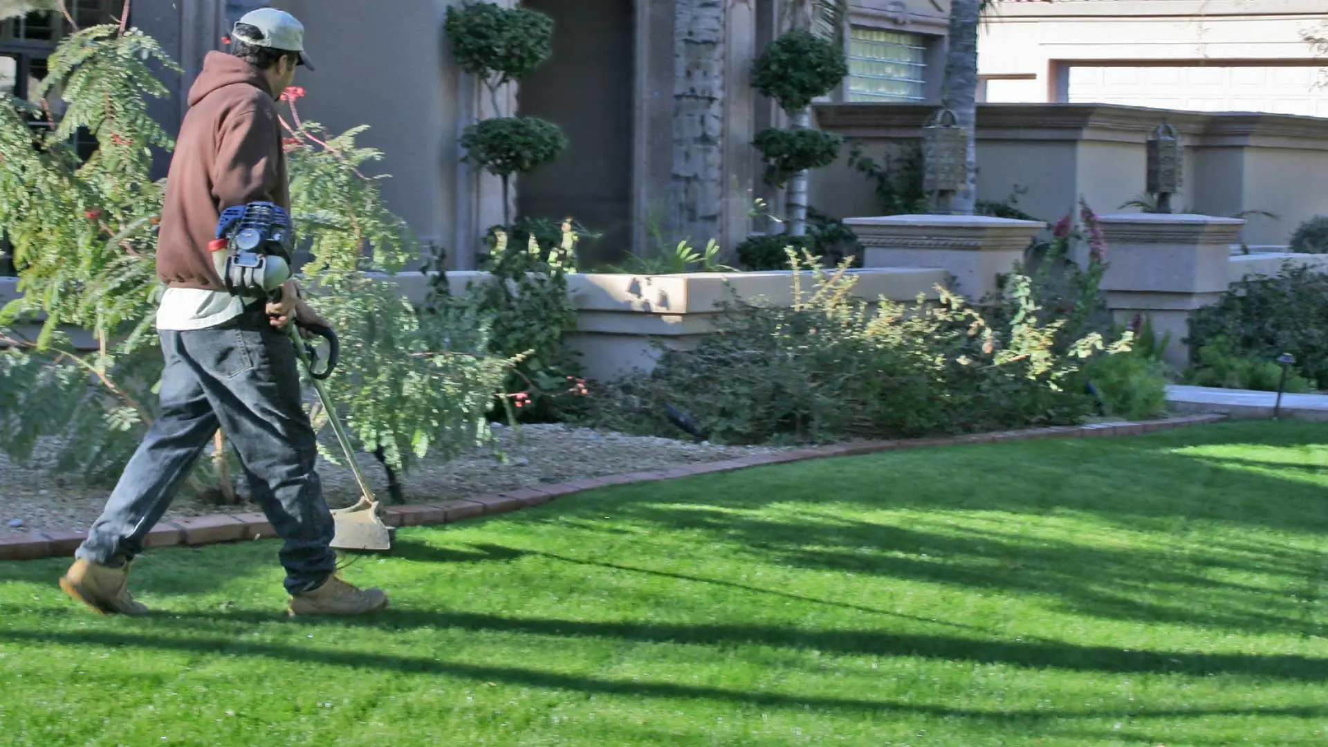 Upstate Turf Pros employee working on a lawn in Greenville, SC.